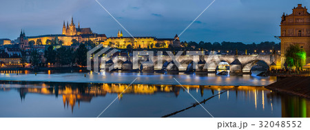 Night view over river Vltava to Charles bridge Night view over river Vltava to Charles bridge 32048552