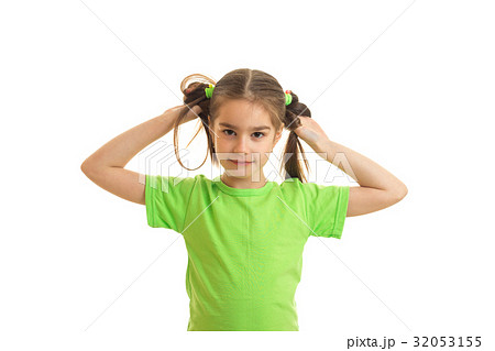 a wonderful little girl in a bright t-shirt keeps a wonderful little girl in a bright t-shirt keeps 32053155