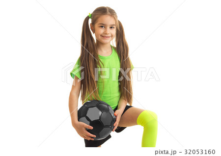 beautiful little girl with long tails smiles and 32053160