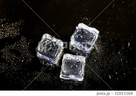 ice cubes on black background. 32053169