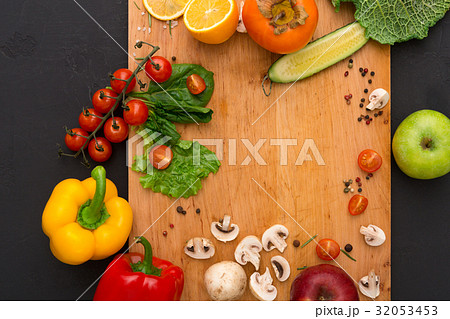 Frame of fresh vegetables on wooden background Frame of fresh vegetables on wooden background 32053453
