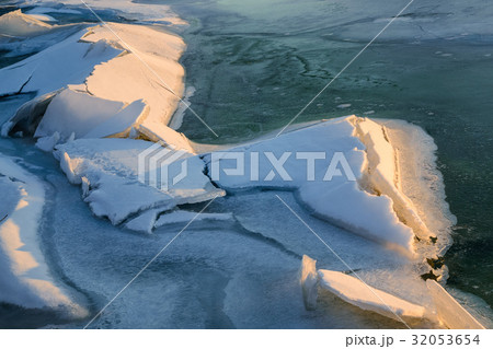 Ice figure in the rays of the setting sun. 32053654