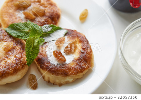 pancakes on a white plate on a white table pancakes on a white plate on a white table 32057350