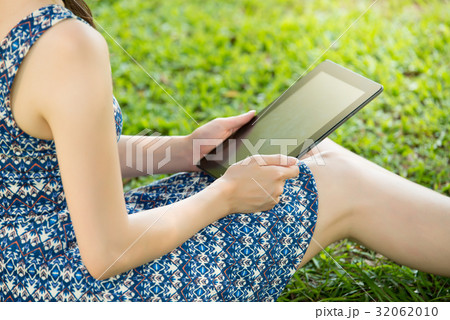 asian woman using digital tablet shopping 32062010