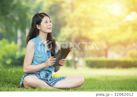 asian woman using digital tablet shopping asian woman using digital tablet shopping 32062012