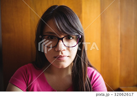 Female student sitting in college 32062617