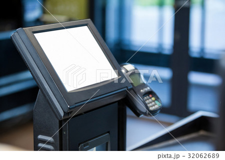 Billing machine and credit card terminal at cash counter Billing machine and credit card terminal at cash counter 32062689