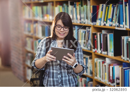 Female student using digital tablet 32062893