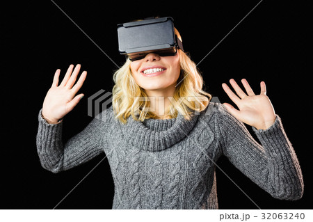 Woman using reality virtual headset 32063240