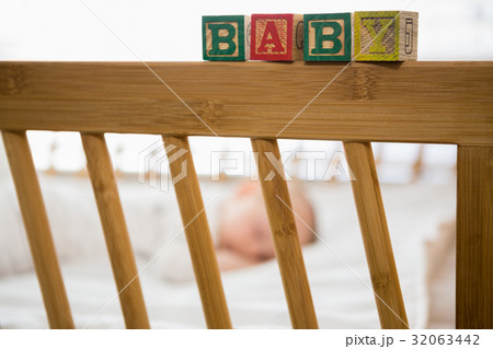 Alphabet blocks on baby bed Alphabet blocks on baby bed 32063442
