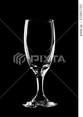 Glass of wine on black background. 32063705