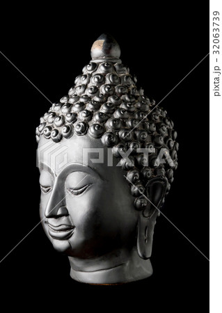 Buddha statue on black background Buddha statue on black background 32063739