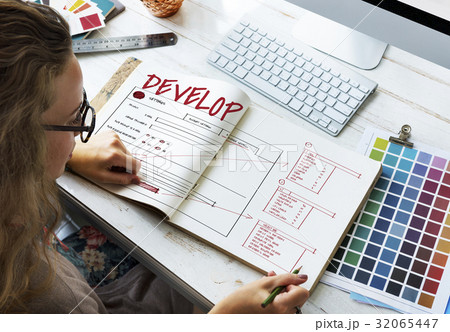 Woman working on notebook network graphic overlay Woman working on notebook network graphic overlay 32065447