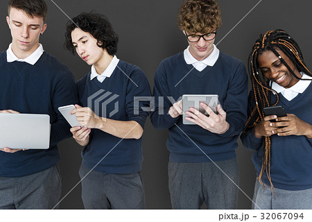 Group of Diverse High School Students Using Digital Devices Studio Portrait Group of Diverse High School Students Using Digital Devices Studio Portrait 32067094