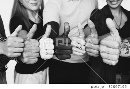 Group of people thumbs up together 32067196