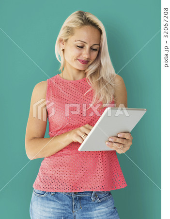 Adult Woman Using Digital Tablet Studio Adult Woman Using Digital Tablet Studio 32067208