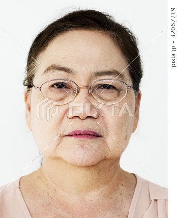 Lonely senior adult woman casual studio portrait 32067219