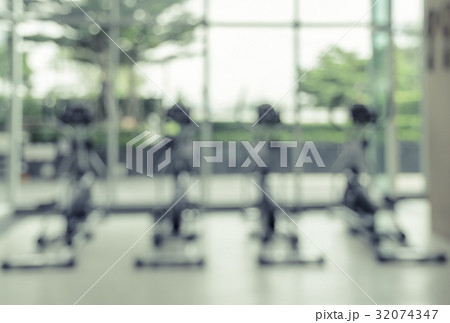 Modern fitness center abstract blur background Modern fitness center abstract blur background 32074347