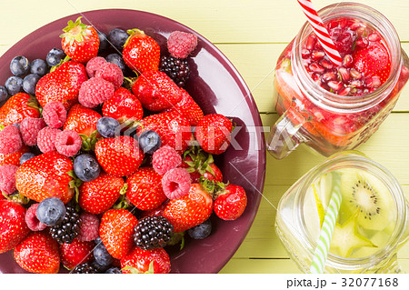 Fruits flavored water in jars mixed soft fruits Fruits flavored water in jars mixed soft fruits 32077168