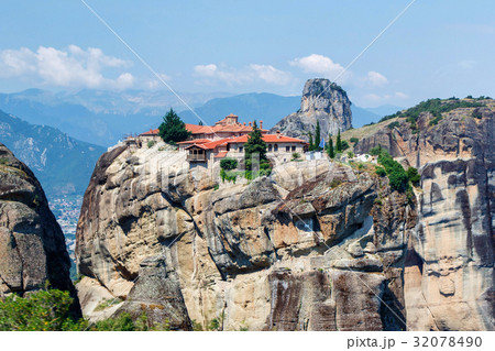 Aerial sunset view on monastery at coast of mountains Aerial sunset view on monastery at coast of mountains 32078490