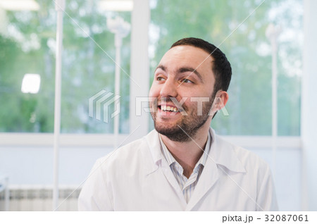 Portrait Of Happy Doctor at hospital ward against 32087061
