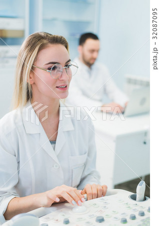 Young Scientists working at chemisty laboratory Young Scientists working at chemisty laboratory 32087095