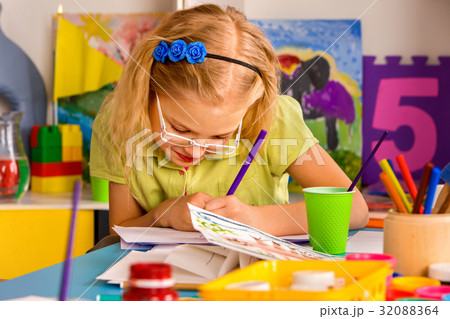 Small students children painting in art school Small students children painting in art school 32088364