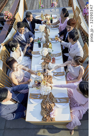 a photo of guest toasting in small wedding reception 32090347