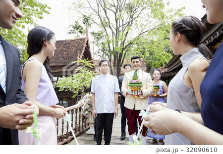 a photo of people doing a part of a religious ceremony.  32090610