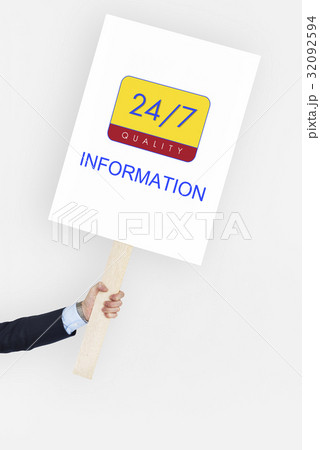 Hand holding a banner with 24/7 service Hand holding a banner with 24/7 service 32092594