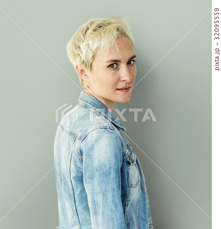 Caucasian Blonde Woman Staring to a Camera Caucasian Blonde Woman Staring to a Camera 32095559
