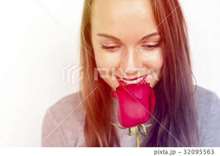 Woman smiling with rose romantic valentine Woman smiling with rose romantic valentine 32095563