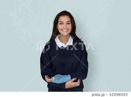 Young Student in Uniform with Broken Arm Studio Portrait 32096083