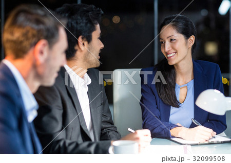 Businessman interacting with a colleague 32099508