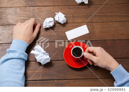 Man holding cup of coffee Man holding cup of coffee 32099991