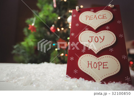 Christmas label with massages of peace, joy and hope 32100850