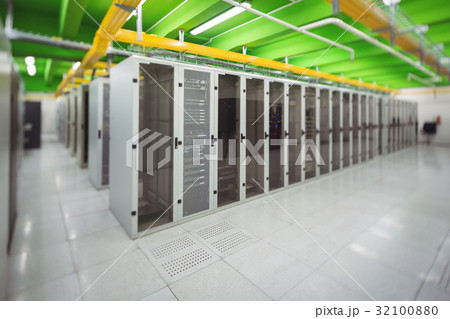 Hallway with a row of servers 32100880