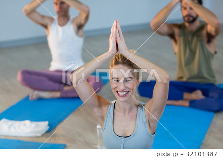 Beautiful woman performing yoga 32101387