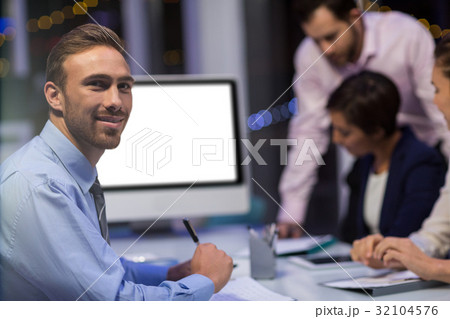 Portrait of businessman in conference room Portrait of businessman in conference room 32104576