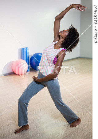 Wan performing stretching exercise 32104607