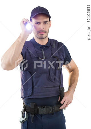Security officer holding a torch Security officer holding a torch 32106651