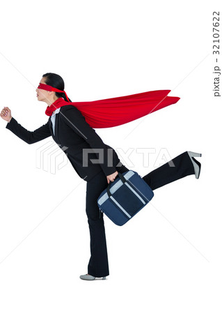 Woman pretending to be a super hero 32107622