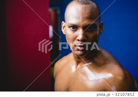 Serious male athlete in gym Serious male athlete in gym 32107852