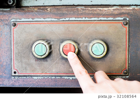 Finger press rustic control panel of old machine 32108564