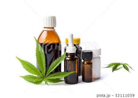 Marijuana and cannabis oil bottles isolated Marijuana and cannabis oil bottles isolated 32111039