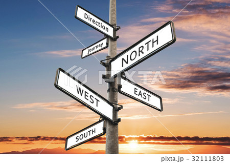 Directional signpost, with summer sky in sunset 32111803