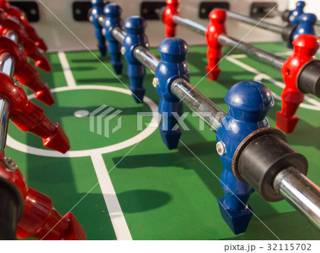 Table football game with red and blue players team Table football game with red and blue players team 32115702