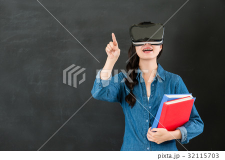 asian woman student touch screen with VR headset 32115703