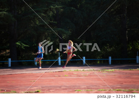 Blurred view of woman athletic running competition Blurred view of woman athletic running competition 32116794