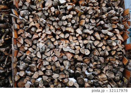 A stack of birch firewood - a natural background 32117976